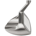 A golf club head angled upwards features a silver metallic finish with a flat face and lined striking surface designed for precision contact while in use on the golf course.