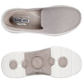 A light beige slip-on shoe with a breathable mesh upper and a white sole rests flat. The interior label reads Skechers Slip-ins Arch Fit while the sole features circular and textured designs.