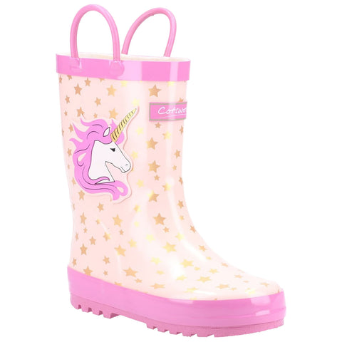 A pink rubber rain boot features a unicorn graphic and gold stars on a translucent background. It has two loop handles for easy wearing and a textured sole for grip.