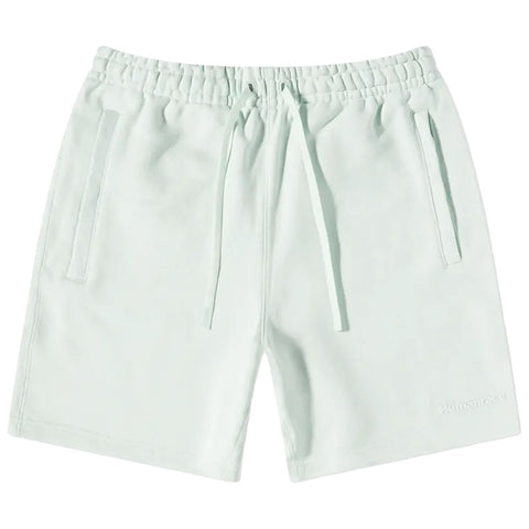 Light green shorts designed for comfort feature an elastic waistband with drawstrings and two side pockets displayed against a plain white background.