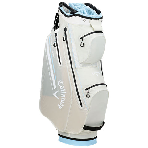 Golf bags in various colors and designs stand upright side by side showcasing their compartments and branding. Each bag is equipped for carrying golf clubs and accessories in a recreational outdoor context.