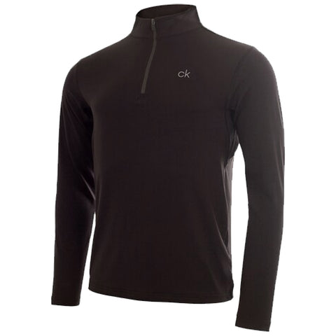 A black long-sleeve shirt features a quarter zip at the collar and has a small logo on the chest, presented against a plain white background.