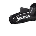 A black golf bag features the Srixon logo prominently. It is positioned horizontally and has a compact design with padded areas for club protection, suitable for golfing in various environments.