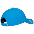 A bright blue baseball cap is positioned upside down showcasing its curved brim and adjustable strap on the back the inside displays a logo and fabric lining.