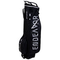 A tall black golf bag stands upright showcasing its branded name in white. It features a zippered compartment and a handle for carrying, suitable for transporting golf clubs to the course.