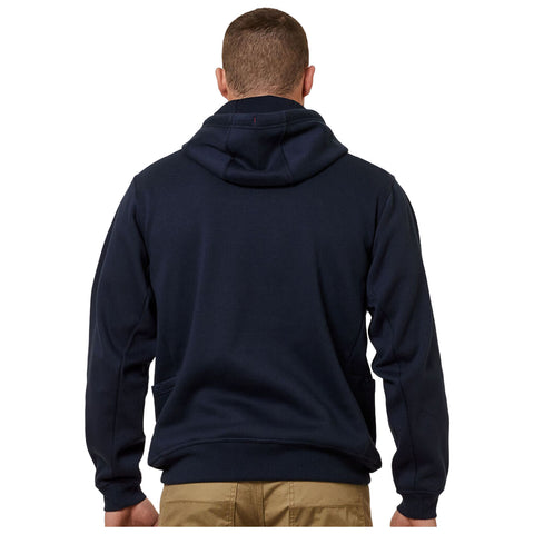 A person is wearing a dark navy hoodie with a hood turned up while standing with their back to the viewer in an undefined indoor setting.