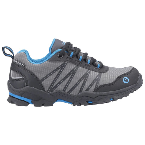 A waterproof hiking shoe is positioned sideways showcasing its grey fabric upper with black and blue accents while the laces are tied indicating it is ready for outdoor activities.