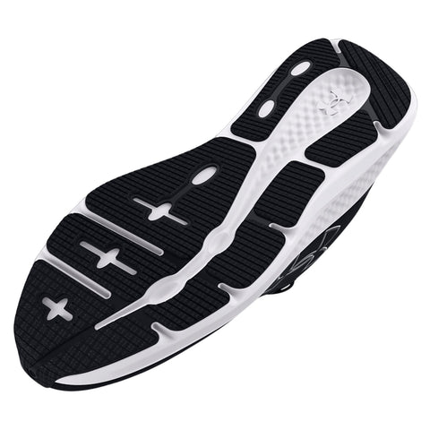 A black and white athletic shoe sole is displayed with textured patterns and grips designed for traction while running or exercising on various surfaces