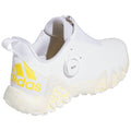 White athletic shoe featuring a sleek design with a yellow Adidas logo and a BOA closure system on the side set against a plain background.