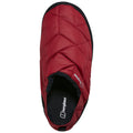 A red quilted slipper is positioned upright showcasing its textured surface and black interior lining in a neutral setting suggesting comfort and warmth for indoor use.