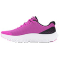 A bright pink athletic shoe is positioned sideways with laces and a textured mesh upper while a thick white sole provides cushioning suggesting a focus on comfort and style for sports activities