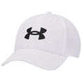 A white baseball cap with a prominent black Under Armour logo rests against a plain background, showcasing its round crown and curved brim designed for casual outdoor wear.