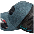 A teal and black cap featuring a prominent black four-leaf clover emblem and text reading Live Lucky is positioned at an angle showcasing its textured fabric and mesh back design.