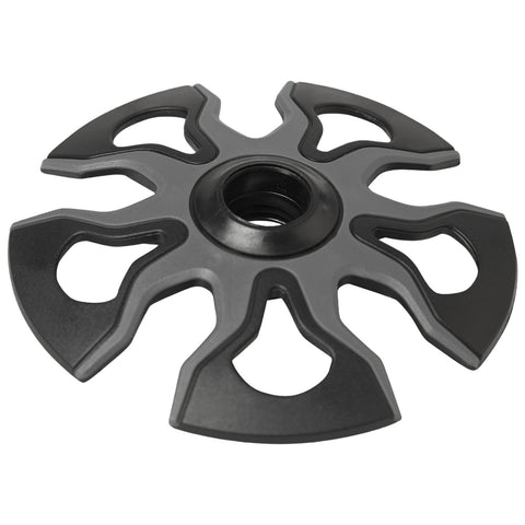 A black, circular weight plate with a central hole and six symmetrical cutouts displays a functional and modern design, typically used in fitness or weightlifting environments.