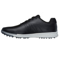 A black golf shoe with a smooth surface features a white sole and spikes on the bottom for grip designed for outdoor sports in grassy environments.