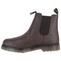 A brown Chelsea boot features a smooth leather exterior with elastic side panels and a pull tab at the back designed for easy wear within a neutral background.