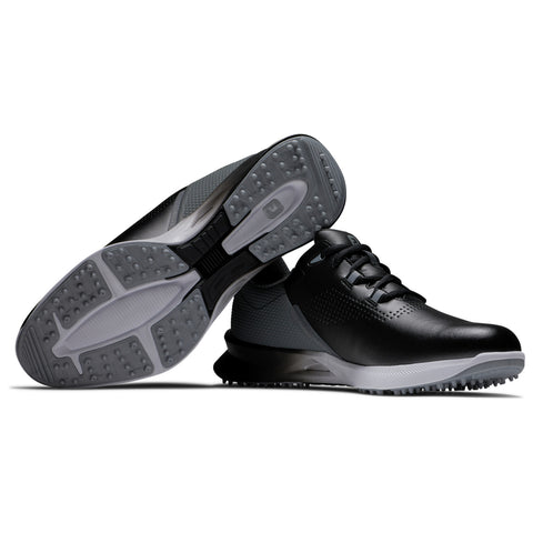 A pair of black sports shoes lies on a white surface with one shoe slightly tilted. The shoes feature a sleek design with textured materials and a durable sole suitable for athletic activities.