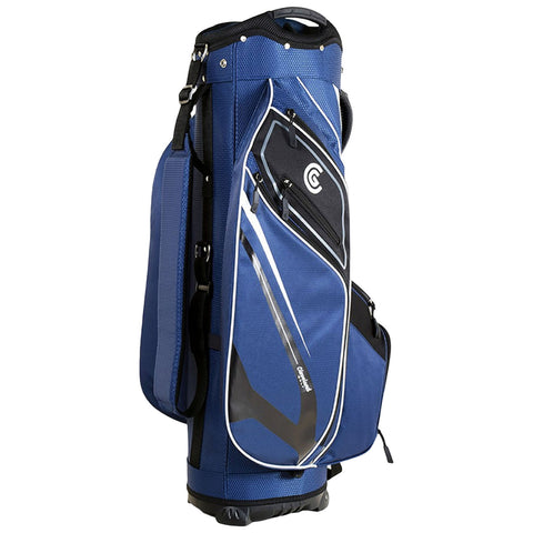 A blue golf bag stands upright showcasing various pockets and zippers for storage it is designed to hold golf clubs and accessories for use on a golf course