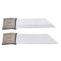 Two white fabric belt straps with silver metal buckles displaying the Under Armour logo are arranged parallel to each other on a neutral background.