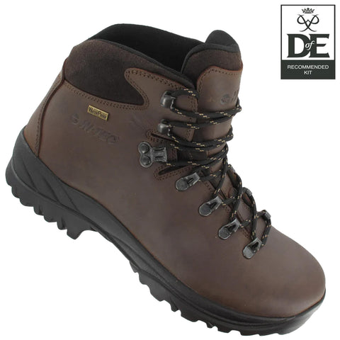 A brown hiking boot features a waterproof exterior sturdy sole and metal lacing hooks designed for outdoor activities placed against a plain background accompanied by a logo in the top right corner.