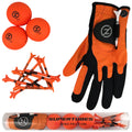 Three orange golf balls and several orange golf tees are arranged next to a black and orange golf glove that holds a tee, all packaged in a transparent tube labeled SUPERTUBES ZERO FRICTION.