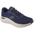 A navy blue athletic shoe sits upright showcasing a mesh exterior and a cushioned sole labeled ArchFit suggesting comfort and support ideal for walking or running.