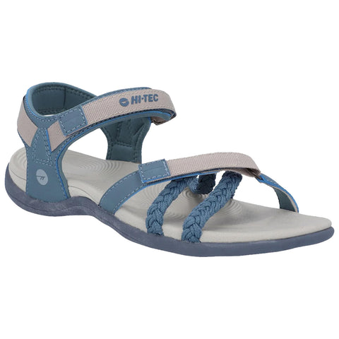 A blue and gray sandal features adjustable straps and a braided front. It is designed for comfort and outdoor activities, showcasing a textured sole suitable for various terrains.