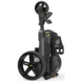 A sleek black and gray golf push cart stands upright in a folded position featuring large wheels and a handle for easy transport in an outdoor or indoor space.