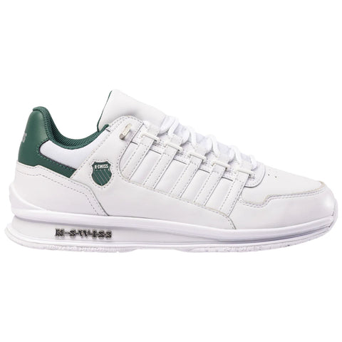 White athletic shoe featuring green accents with a lace-up design on the upper and a textured sole placed against a plain background for emphasis on the shoe's design.