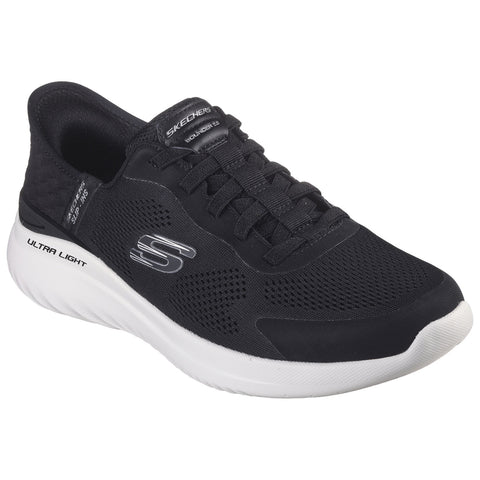 A black athletic shoe with a mesh upper features laces and a white sole labeled ultra light designed for comfort and performance in casual or workout environments.