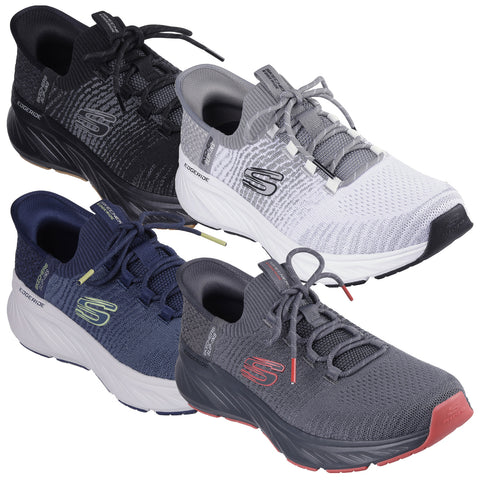 Four pairs of athletic shoes are displayed featuring varying color schemes of black grey white and navy. The shoes are positioned together showcasing their modern design and lacing system.