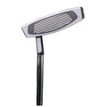 A golf putter stands upright showcasing its flat clubhead with grooves designed for striking a golf ball on a course or practice green. The handle extends downward from the clubhead.