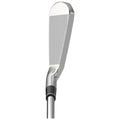 A golf club head is positioned upright showing its polished metal face with grooves designed for striking a golf ball against a plain white background.