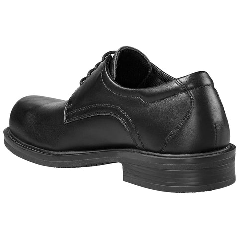 A black leather shoe sits on a flat surface showcasing a sleek design with a rounded toe and laces demonstrating an elegant and formal appearance suitable for various occasions.