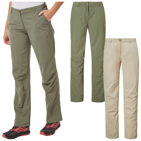 Three pairs of outdoor pants are displayed side by side in two colors including olive green and beige one pair is worn by a person showing a front pocket.