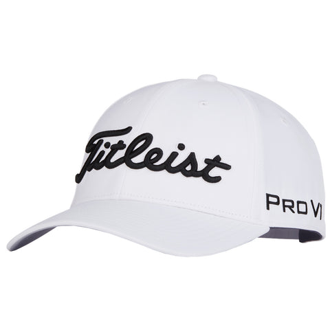 A white cap features prominent black embroidered lettering reading Titleist on the front and Pro V1 on the side, designed for outdoor wear, particularly in golf contexts.