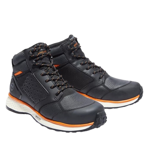 High-top athletic shoes feature a black exterior with orange accents and textured patterns. They are positioned side by side against a plain white background, emphasizing their design.