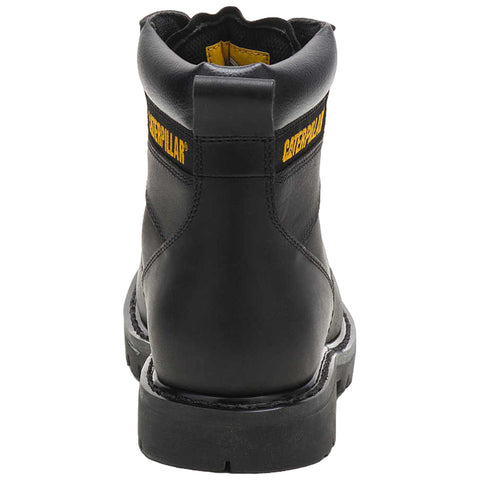 A black work boot with a sturdy sole stands upright showcasing its robust design and yellow branding on the back indicating the brand name equipped for industrial use.