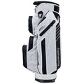 A golf bag in white with black accents stands upright displaying multiple zippered compartments designed for storage and organization of golf clubs and accessories in an outdoor sporting context.