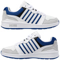 White and blue sneakers with a mesh upper and suede accents display a sleek design resting upright against a plain background. The sneakers feature prominent branding and striped details.