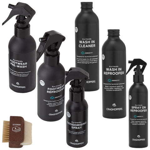 A collection of six black spray bottles and one brush labeled with product names for cleaning and maintaining outdoor footwear with eco-friendly features displayed on a white background.