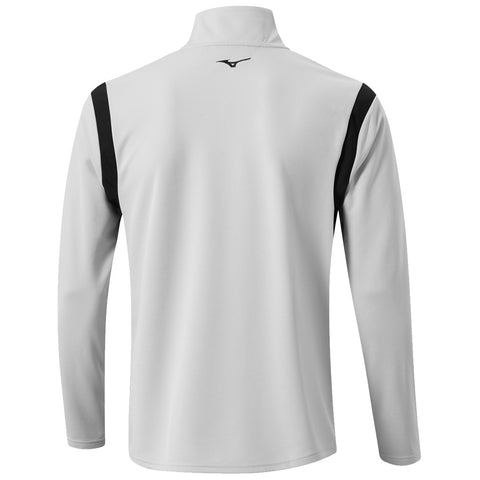 A long-sleeved athletic shirt in light gray features black shoulder accents and a high collar, designed for sportswear use. The brand logo appears on the upper back.