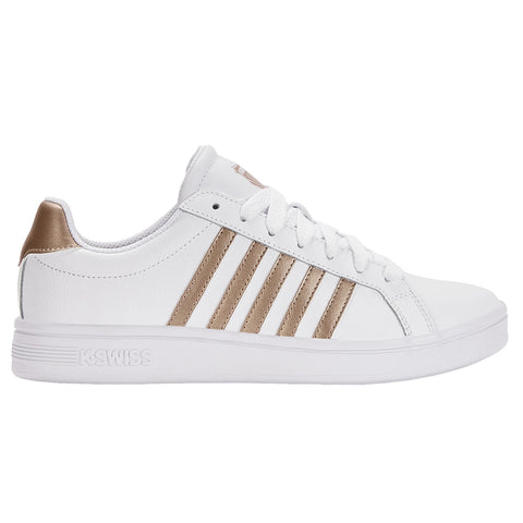 A white sneaker with gold accents features a smooth exterior and a lace-up design while positioned against a plain background showcasing its sleek style.