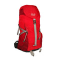 A red backpack stands upright featuring gray straps and buckles designed for outdoor use. The backpack has a spacious compartment and is made from durable materials suitable for hiking adventures.