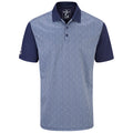 A polo shirt features a patterned design in blue and white with a solid dark blue collar and sleeves showcasing a contemporary style suitable for casual or athletic wear.