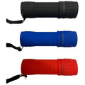 Three flashlight grips in black blue and red are stacked vertically each featuring a textured surface and a strap attached to the side suitable for climbing or outdoor activities.