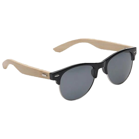 Sunglasses with dark lenses and wooden arms rest horizontally with the black front frame facing forward in a neutral background. The design combines modern and natural elements.