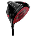 A black golf driver with a sleek design and a red patterned face is positioned at an angle showcasing its aerodynamic shape and technology features in a neutral background.