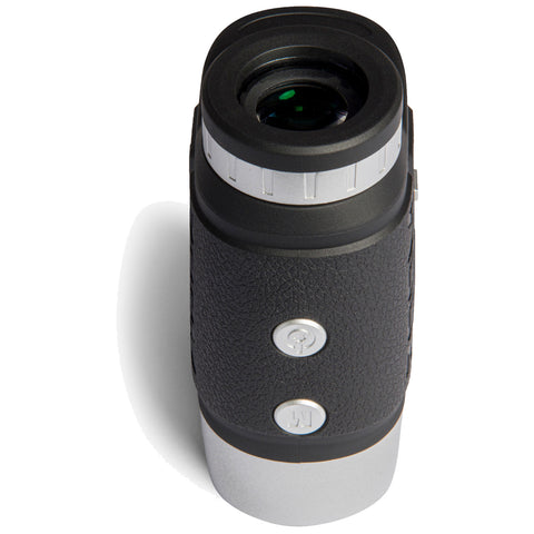 A small handheld binocular features a black textured surface with silver accents and two buttons on the side designed for adjusting focus in various outdoor settings