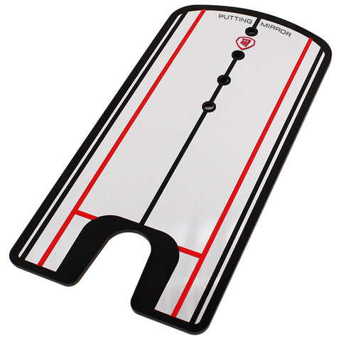 A rectangular putting mirror designed for golf practice displays bold black and red lines with circular holes marking alignment points situated on a flat reflective surface for improving putting skills.